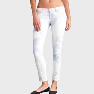 J Brand 910 skinny, low rise, acid-washed jeans